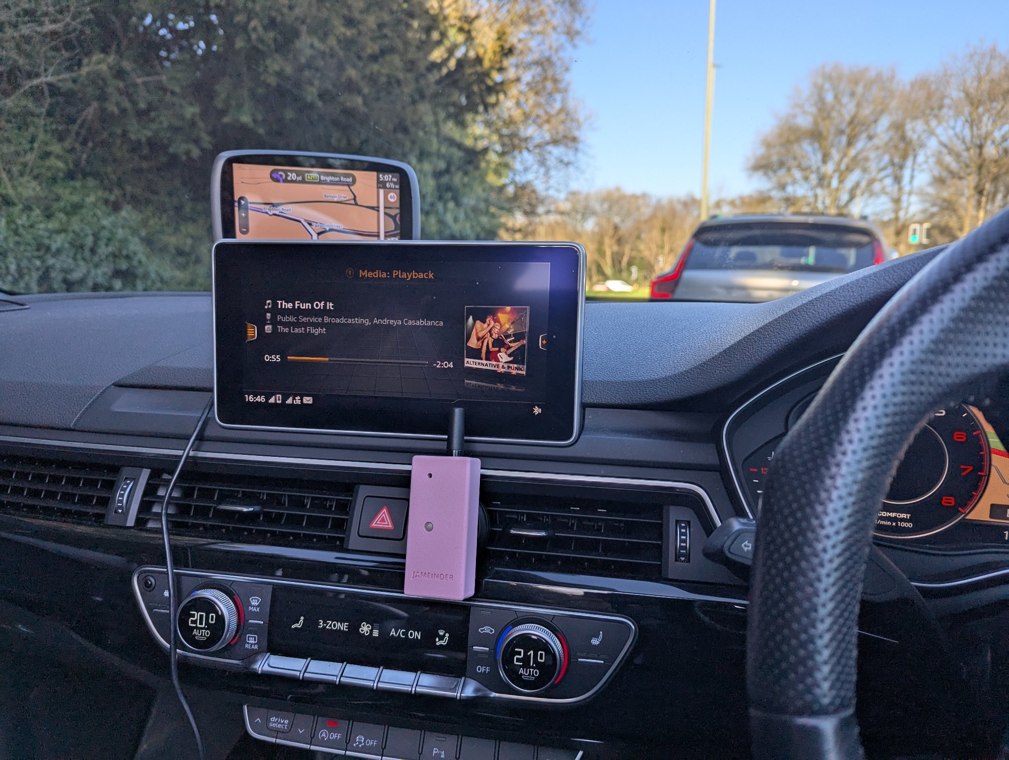 JamFinder mounted on dashboard of an Audi — in-vehicle placement